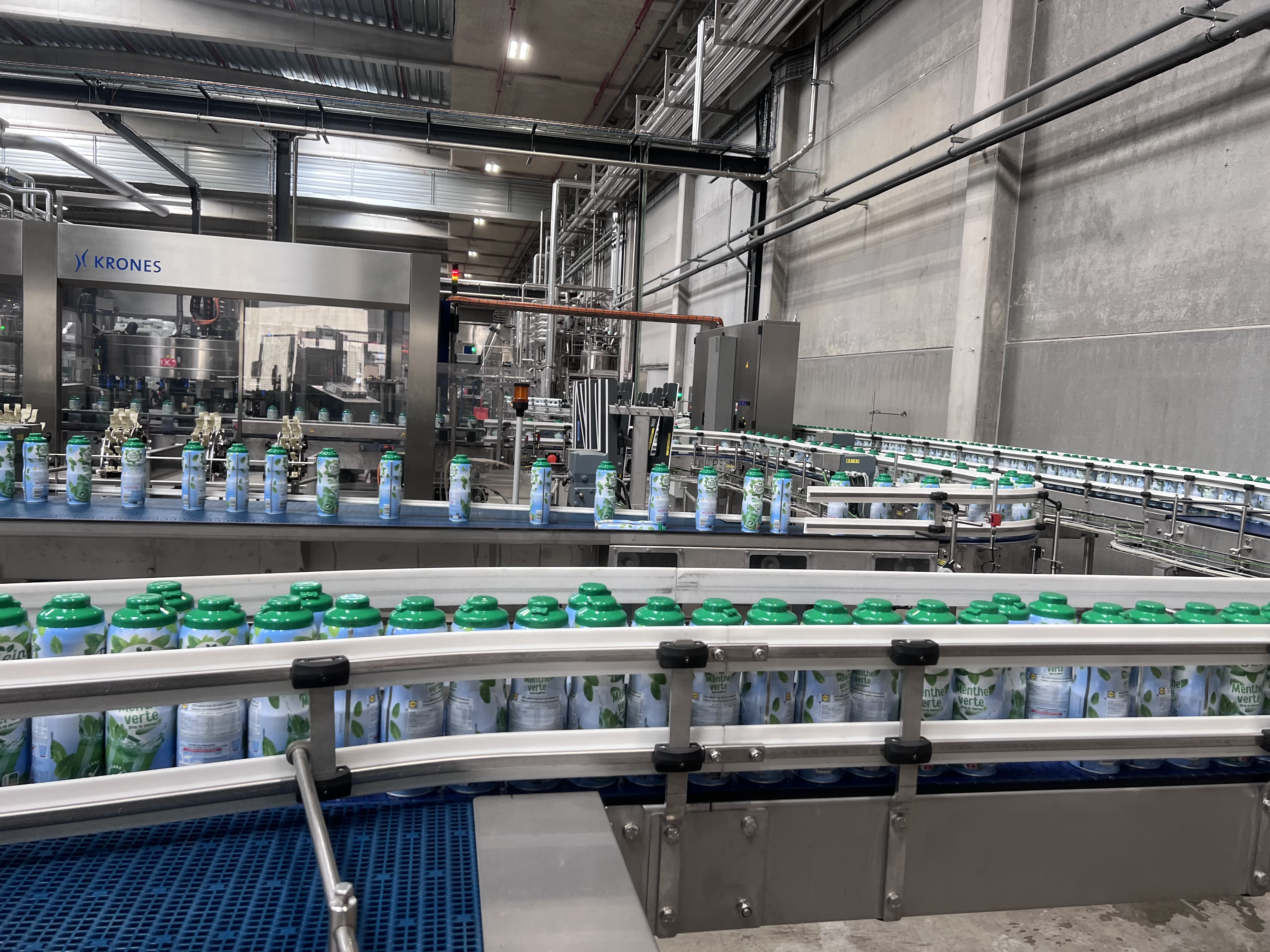 Convoyeur industriel pour produits unitaires sur ligne de conditionnement