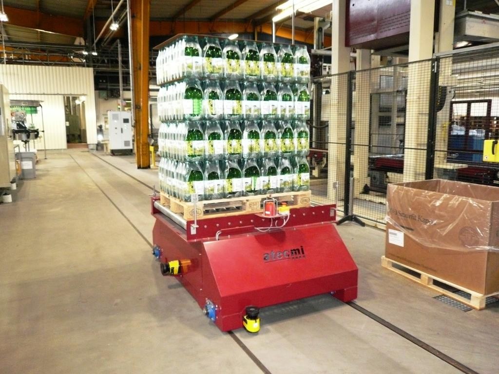 Convoyeur de palettes robuste pour transport de charges lourdes en continu